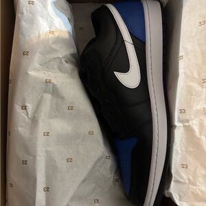 Nike Black and Blue Sneakers with High-Top Design and White Swoosh